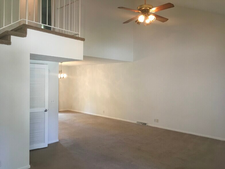 Unique vaulted ceilings that make a statement when walking into this townhouse - 12063 Burdette Cir