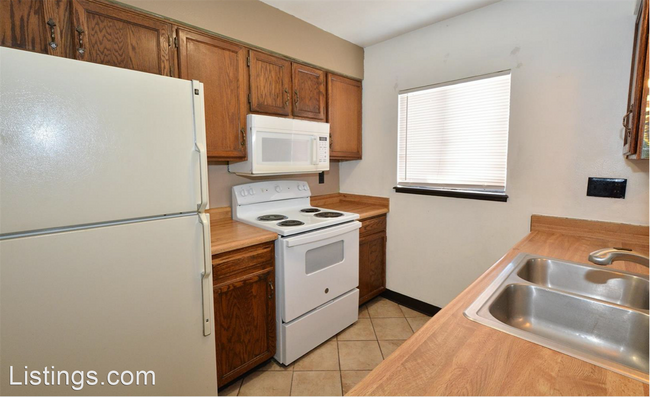 Building Photo - 3 br, 1 bath House - 8195 Freemantle Dr