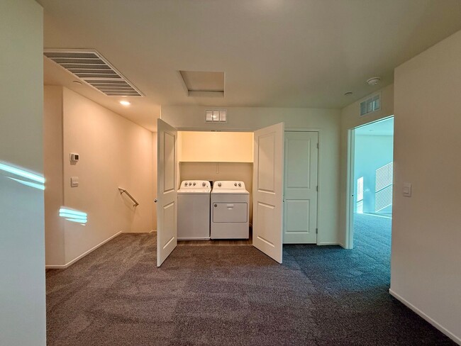 Building Photo - Brand-New Townhome for Rent in the Highly ...