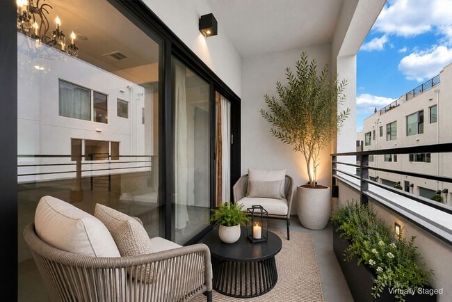 Building Photo - Modern 4-Bed with Rooftop Balcony & Dual Primary Suites