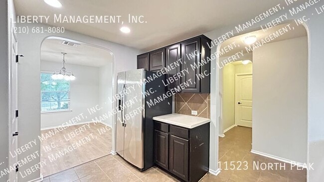 Building Photo - 11523 North Peak-