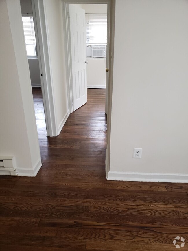 Building Photo - NOW LEASING AT BUNKER HILL FLATS!