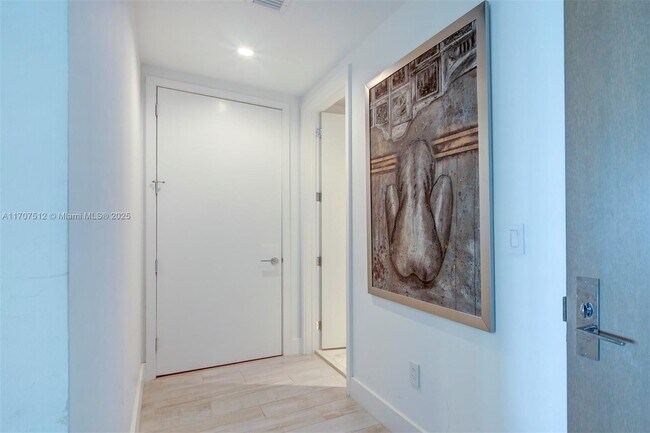 Building Photo - 10201 Collins Ave