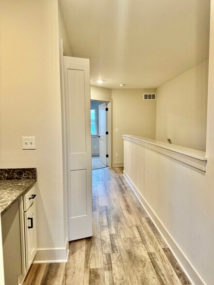 Upstairs hallway, by laundry - 22912 W 72nd Ter