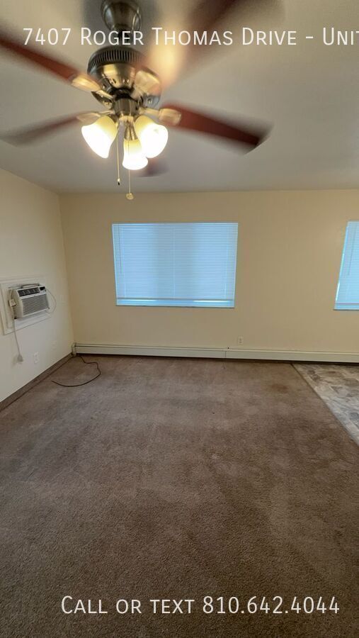 Building Photo - 7407 Roger Thomas Dr