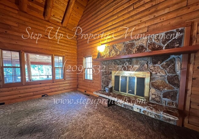 Building Photo - Rustic Retreat: Charming 1-Bedroom Log Cab...