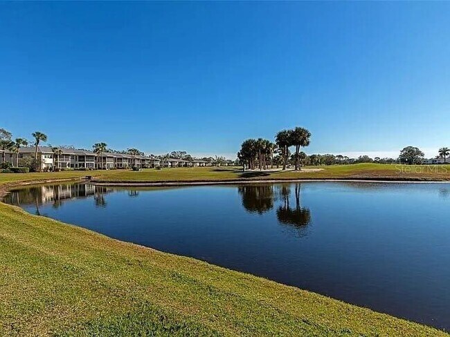 Building Photo - 6999 W Country Club Dr N