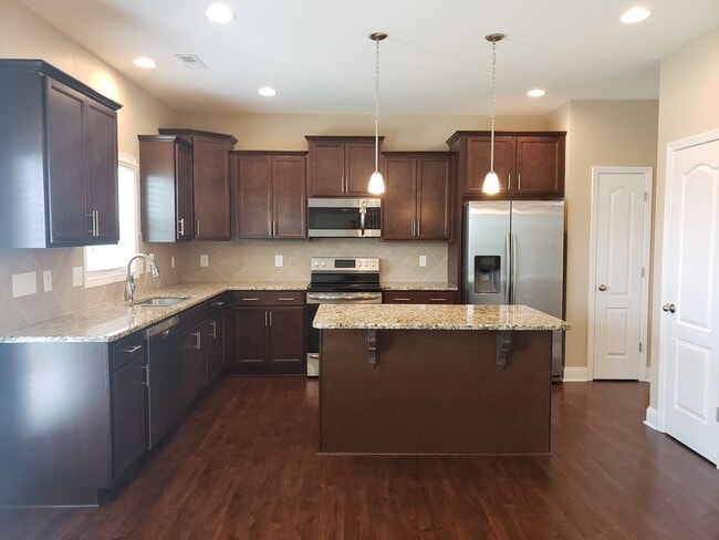 Building Photo - Practically New Home w/Fenced Back Yard Lo...