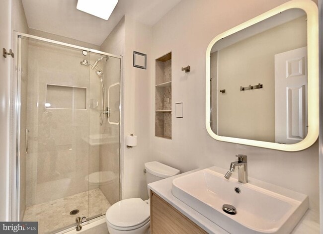 Building Photo - Discover an exquisite opportunity to lease a stunning end-of-row townhouse in the prestigious Bet...
