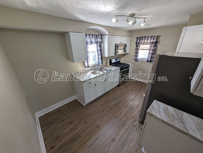 Building Photo - Updated 3-Bedroom Home with Private Upper Suite & Detached Garage