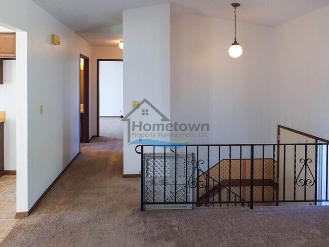 Building Photo - Spacious 4 Bedroom Home with Fenced Backyard & Garage