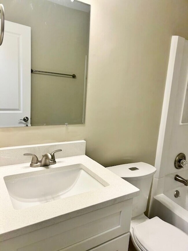 Building Photo - Available Beautifully Renovated Bungalow!
