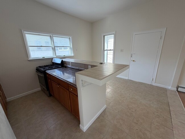 Building Photo - 369-371-371 Ave E