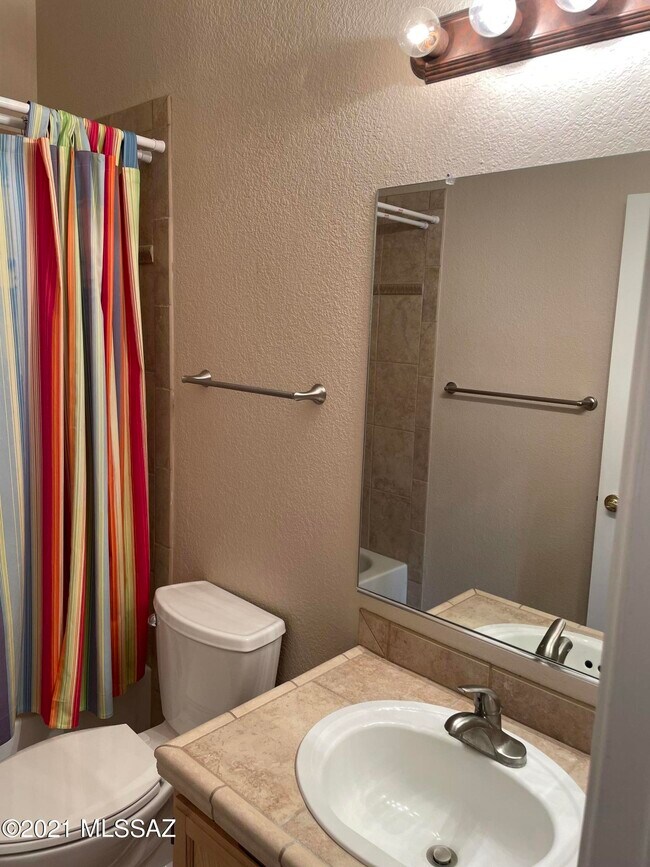 Building Photo - 6655 N Canyon Crest Dr