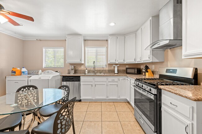 Building Photo - Fully Furnished 2BR Home with Crib — Mid-T...