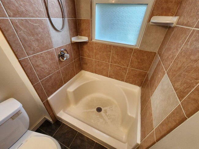 Building Photo - 4 BR home with first-floor living, new roof, and a private-feeling backyard in Lincoln Place