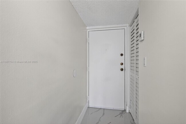 Building Photo - 9915 W Okeechobee Rd