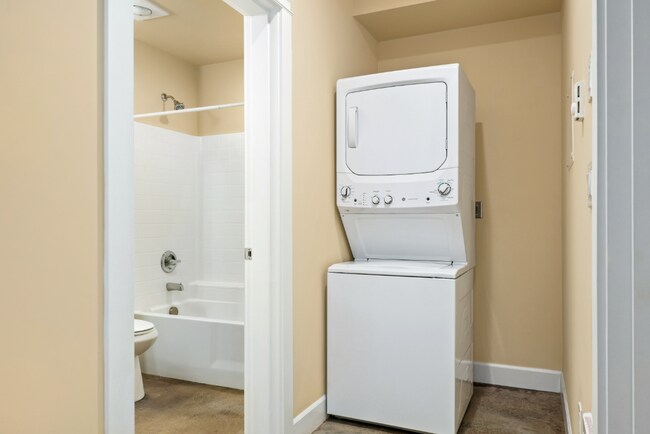 Building Photo - Sophisticated One-Bedroom Living at Marigold Apartments — Available Now