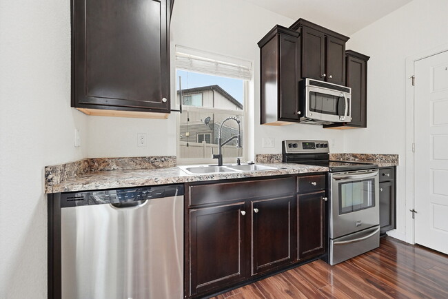 Building Photo - $2,245.95, 2 bed, 2.5 bath located in Denver with a fenced yard.