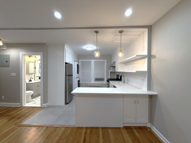 Building Photo - 100-03 Ascan Ave