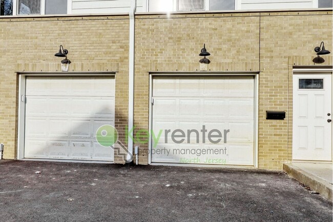 Building Photo - Modern New Construction 3 Bedroom Townhome with Garage & Driveway — First Occupancy!