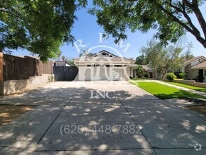 Building Photo - Modern Spacious 4-Bedroom Home with Pool i...
