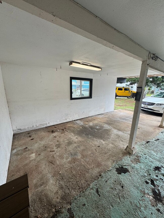 Building Photo - Completely Renovated 2 Bedroom/ 1 Bath with Ocean Access, Yard, Storage, Carport, A/C, Pets Allowed