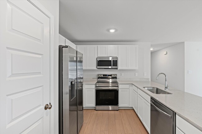 Building Photo - New 4BR Home in Whispering Woods – Spaciou...