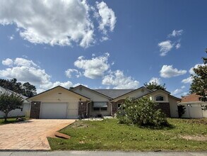 Building Photo - Spacious Pool Home in Desirable Palm Harbor – Pool Care Included