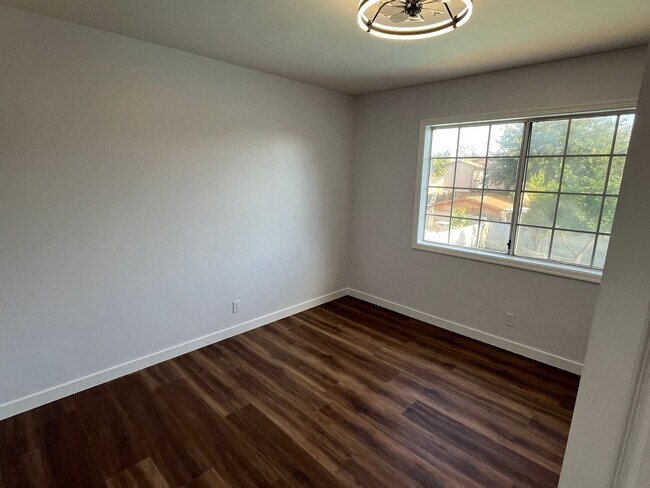 Building Photo - Reseda 4+3 w/fireplace, vaulted ceilings, new flooring, solar panels, + pool!