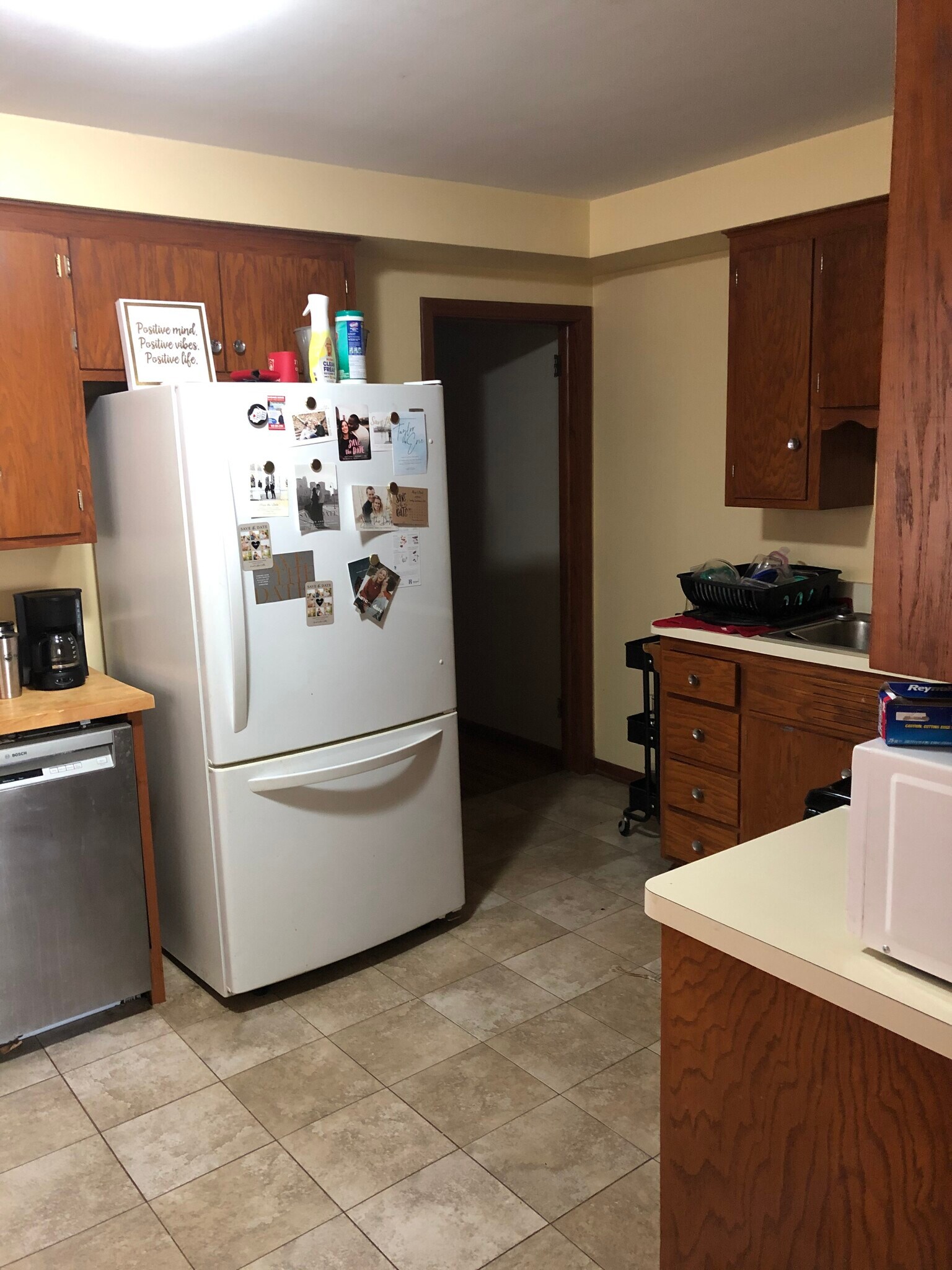 Kitchen with new fridge and dishwasher - 3522 Holmes Ave