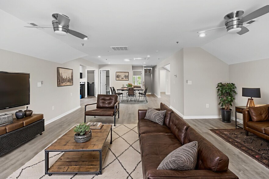 Main Living (staged with AI - E) - Stewart Legacy Suites