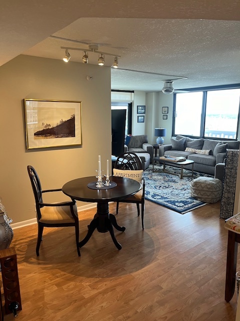 dining room and living room - 400 E Colonial Dr