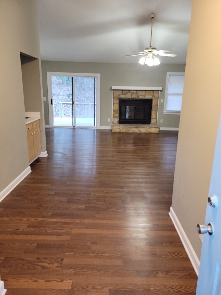 Living room with fireplace and wet bar - 7016 Cedar Rd