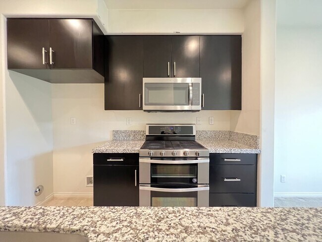Building Photo - Wonderful 3 Bedroom 3 Bathroom Anaheim Condo in Gated Community