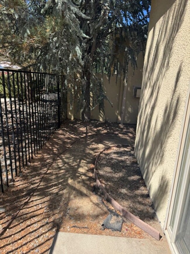 Building Photo - Located in a Quiet, Gated Community in Car...