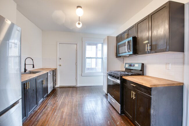 Building Photo - 49-51 Kibbe St - Unit 202
