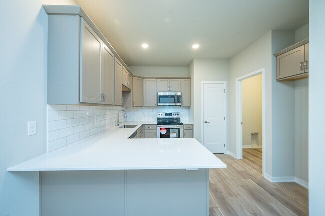Building Photo - Brand-New 3-Bed Townhome with Attached Gar...