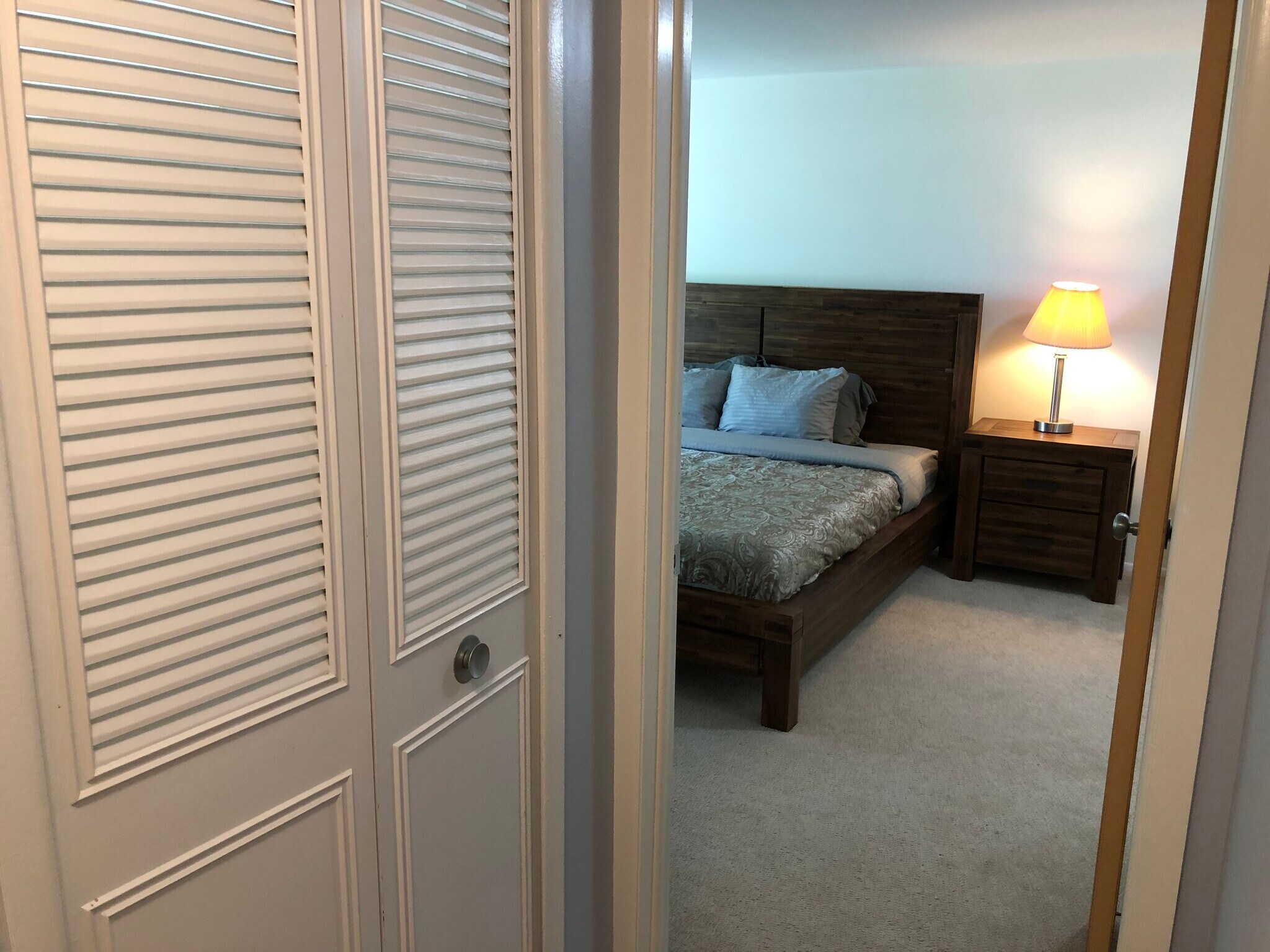Spacious upstairs bedroom features delux king bed, walk in closet and 42" TV - 8328 Karam Blvd
