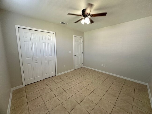 Building Photo - Fenced 3/2 with Screened Lanai in NE Cape Coral