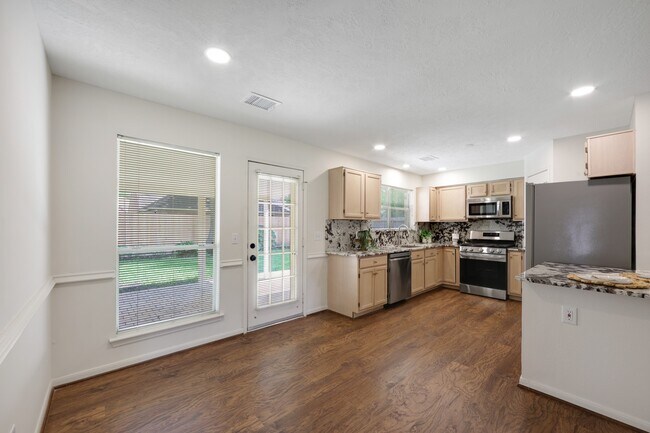 Building Photo - 8910 Driftstone Dr