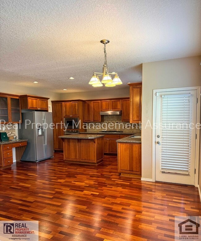 Building Photo - 13611 NW Stonebridge Dr