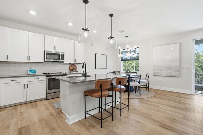 Building Photo - Fully Furnished 3 Bedroom, 3.5 Bath Townhome