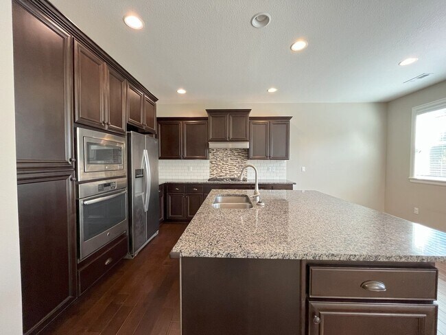 Building Photo - Spacious 4-Bedroom + Bonus Room with Moder...