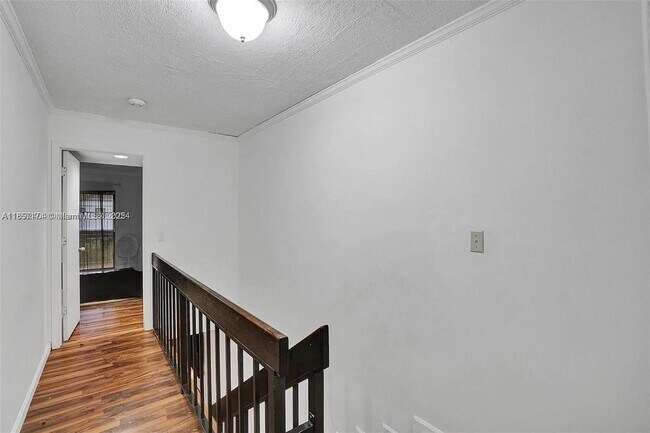 Building Photo - 6483 Racquet Club Dr