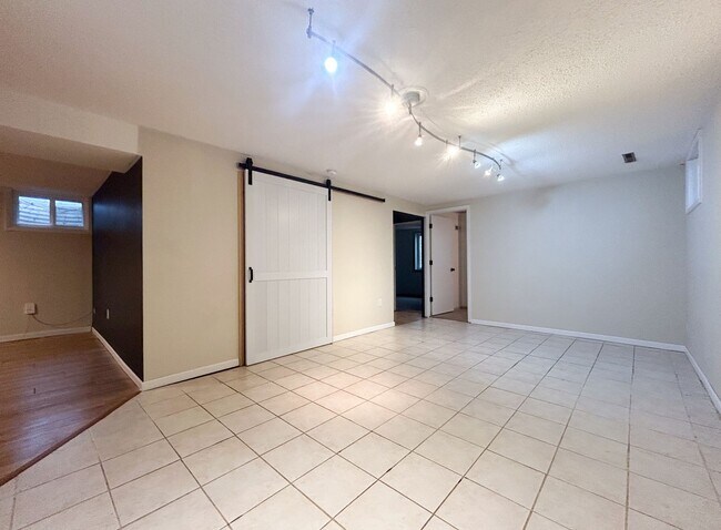 Building Photo - Wonderful Large 5 Bedroom House with Fenced Back Yard and 2-Car Garage