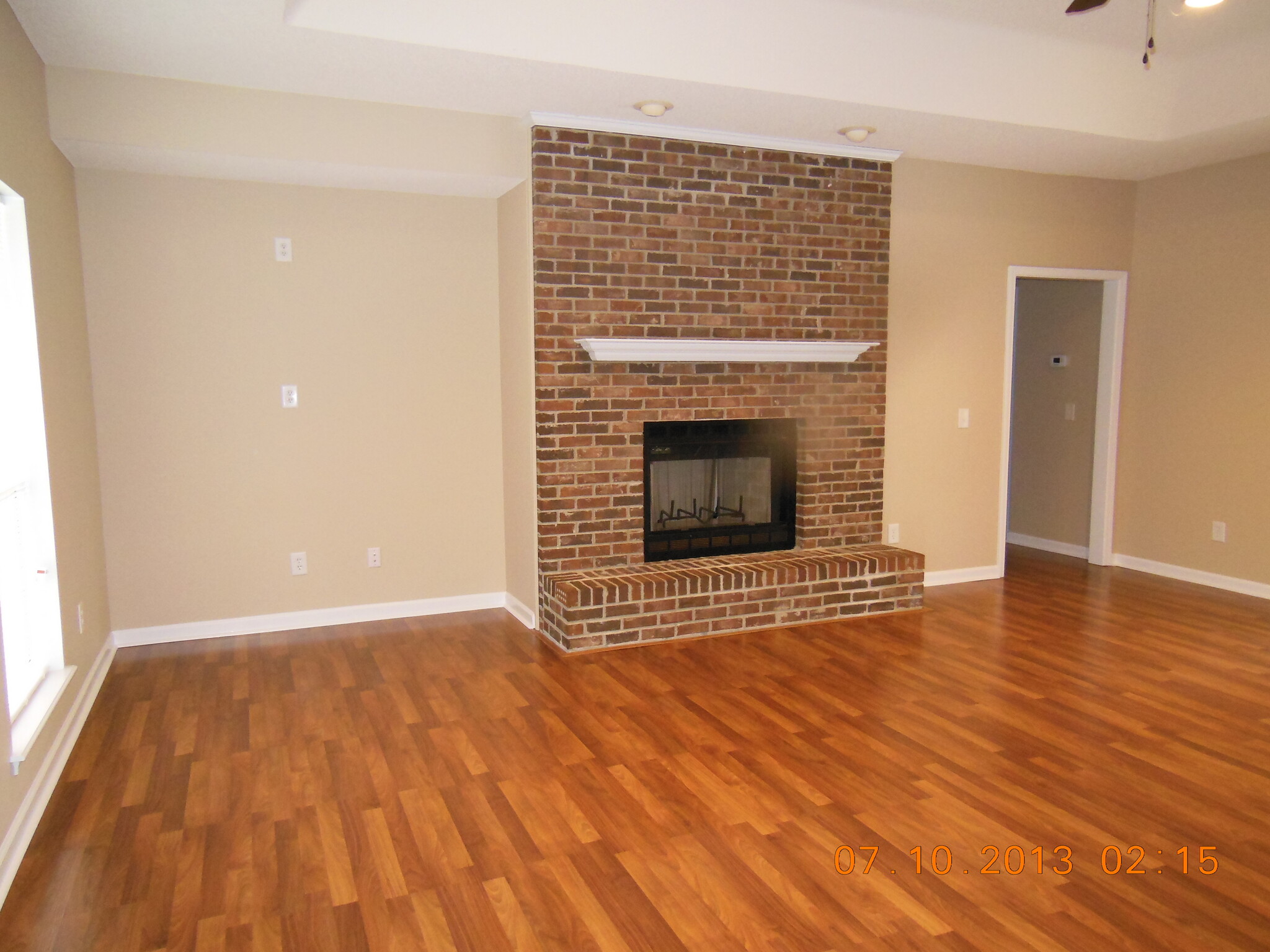 Large and Spacious Living/Family Room with Brick Fireplace - 1906 Parker Rd