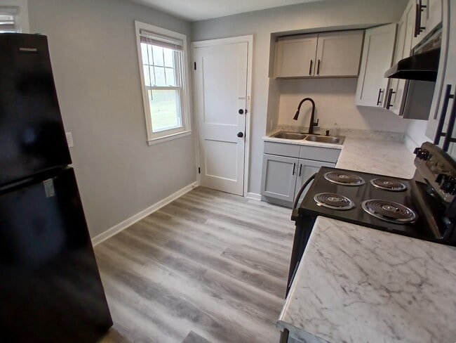 Building Photo - Milpine Garden Townhomes