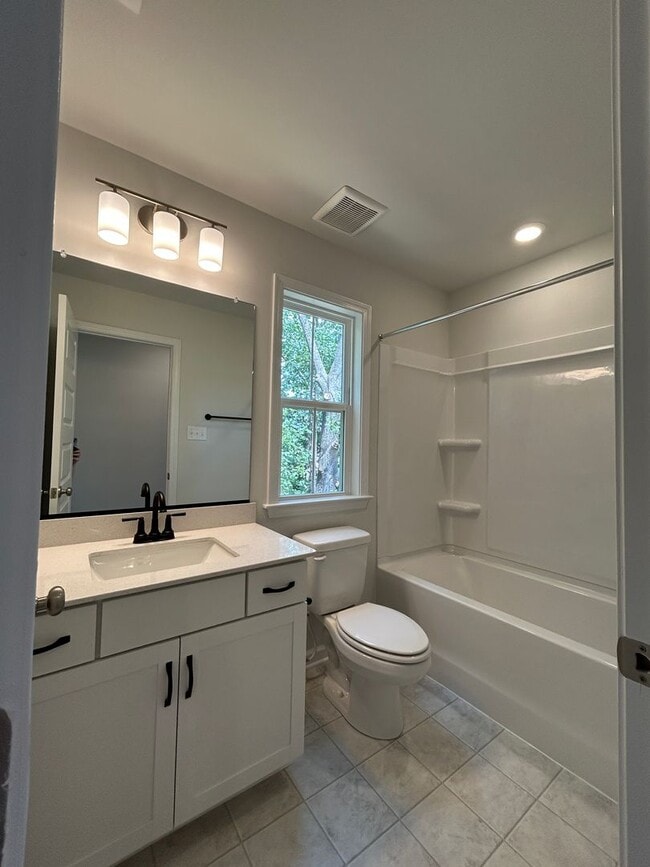 Building Photo - Luxury End-Unit Townhome with 2-Car Garage, Deck & Bonus Room – Available June 5!