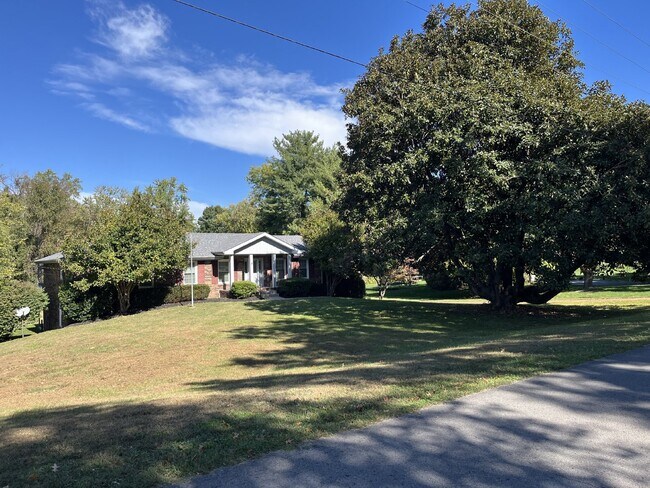 Primary Photo - "Charming 3-Bed Sanctuary with Finished Ba...